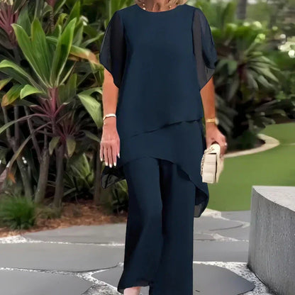 ✨50% RABATT – Charmigt set med oregelbunden topp 👗 Elegant set med vida byxor – Bekväma och perfekta för våren