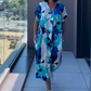 👗 60% RABATT! 🌸 Elegant V-halsad Klänning med Tryck för Kvinnor – Flytande Tyg, Smickrande Passform & Perfekt för Våren ☀️