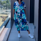 👗 60% RABATT! 🌸 Elegant V-halsad Klänning med Tryck för Kvinnor – Flytande Tyg, Smickrande Passform & Perfekt för Våren ☀️
