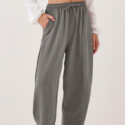 👖 50% RABATT NU! 🌿 Casual Byxor med Vida Ben & Dragsko för Kvinnor – Lätt Rynkade Detaljer & Sidfickor – Perfekt för Avslappnad Vardag ☀️