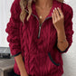 Sudadera con medio cremallera y bolsillo peludo