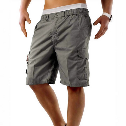 🩳 50 % RABATT NU! 🏕️ Casual cargoshorts för män med resår i midjan – flera fickor, slitstark polyester & knälång passform – perfekt för äventyr 🌿